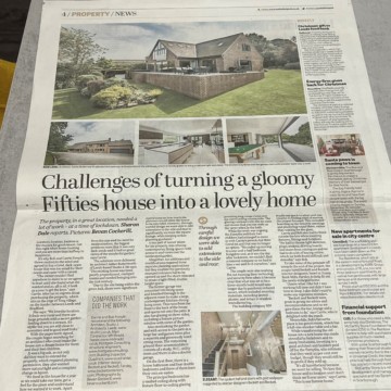 architect in newspaper