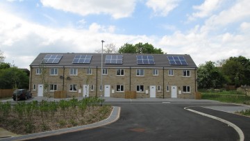 new build stone terraced houses